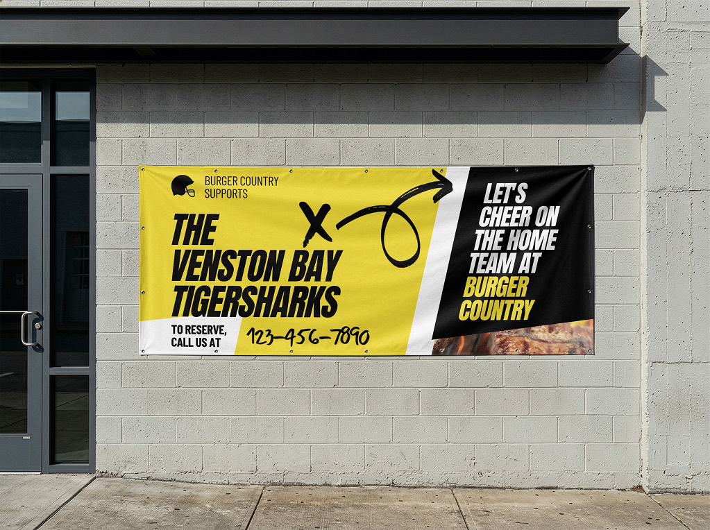 Full-color vinyl sports banner on a storefront wall